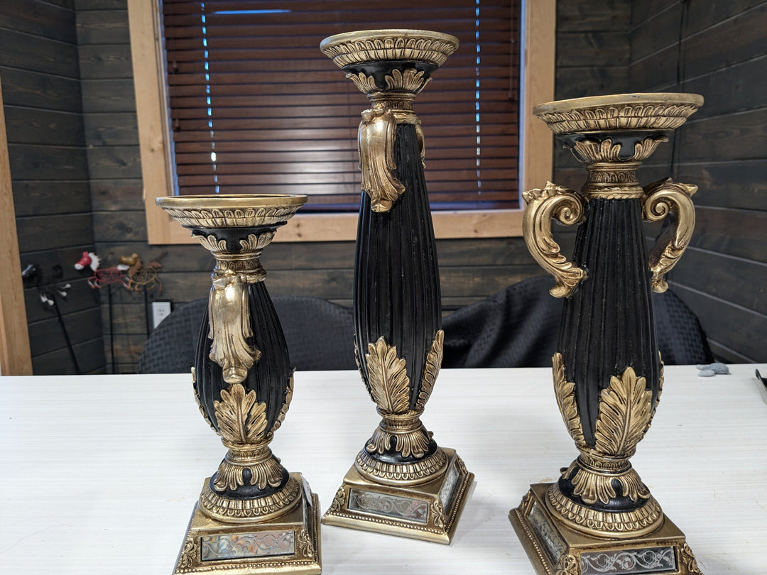 Camilla Black Candleholders – Elegant set of black candleholders designed to enhance any home decor. Perfect for modern, minimalist, or contemporary styles, these candle holders add sophistication and ambiance to dining tables, mantels, or special occasions.
