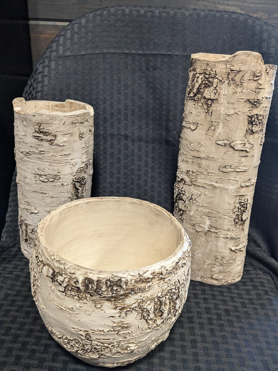 Birch Finish Pot and 2 Finish Pillar Holders set – a stylish trio featuring a natural birch finish pot perfect for plants or flowers, accompanied by two elegantly designed pillar holders. Ideal for adding rustic charm and warmth to your home decor.