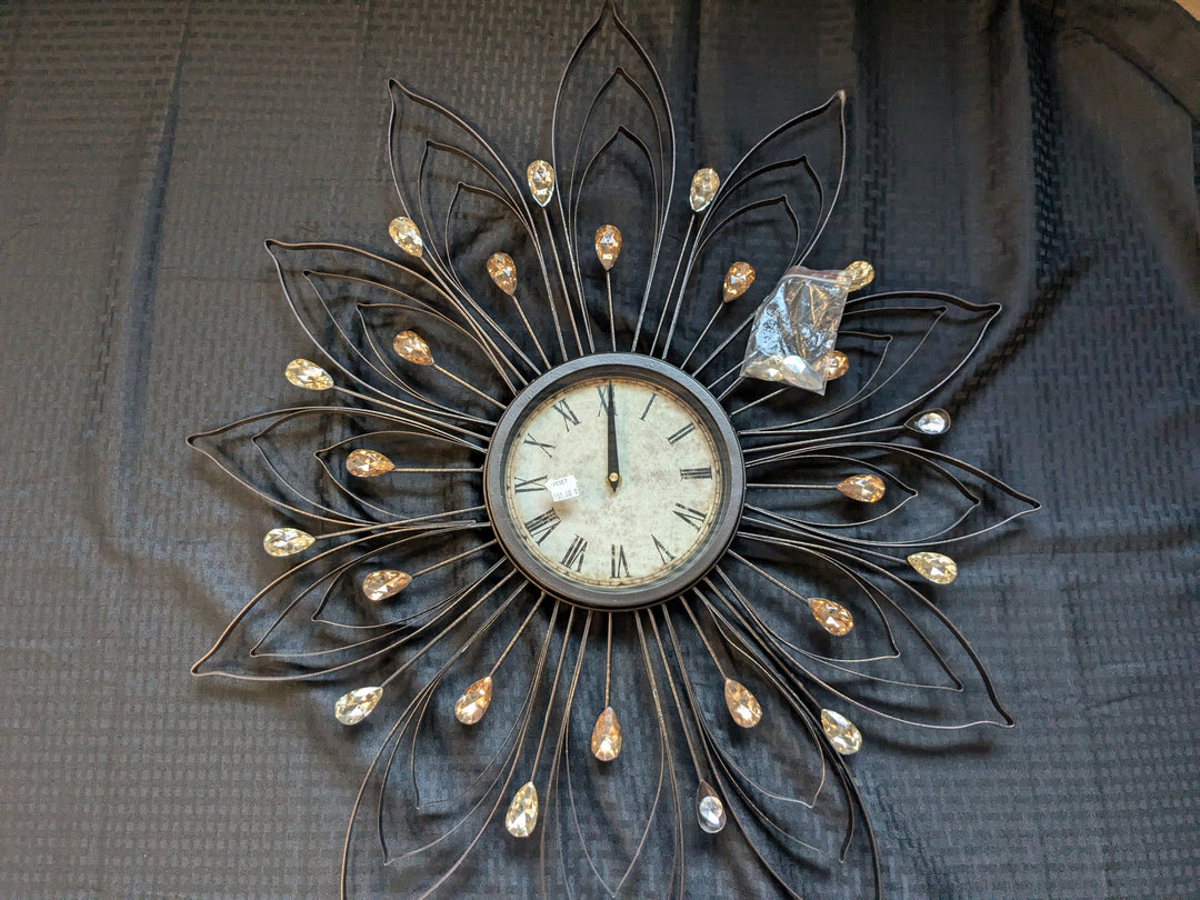 Bejeweled Bronze Wall Clock – an elegant timepiece featuring a luxurious bronze finish with exquisite jeweled accents, perfect for enhancing home decor. Ideal for living rooms, dining areas, or hallways, combining functionality with artistic design.