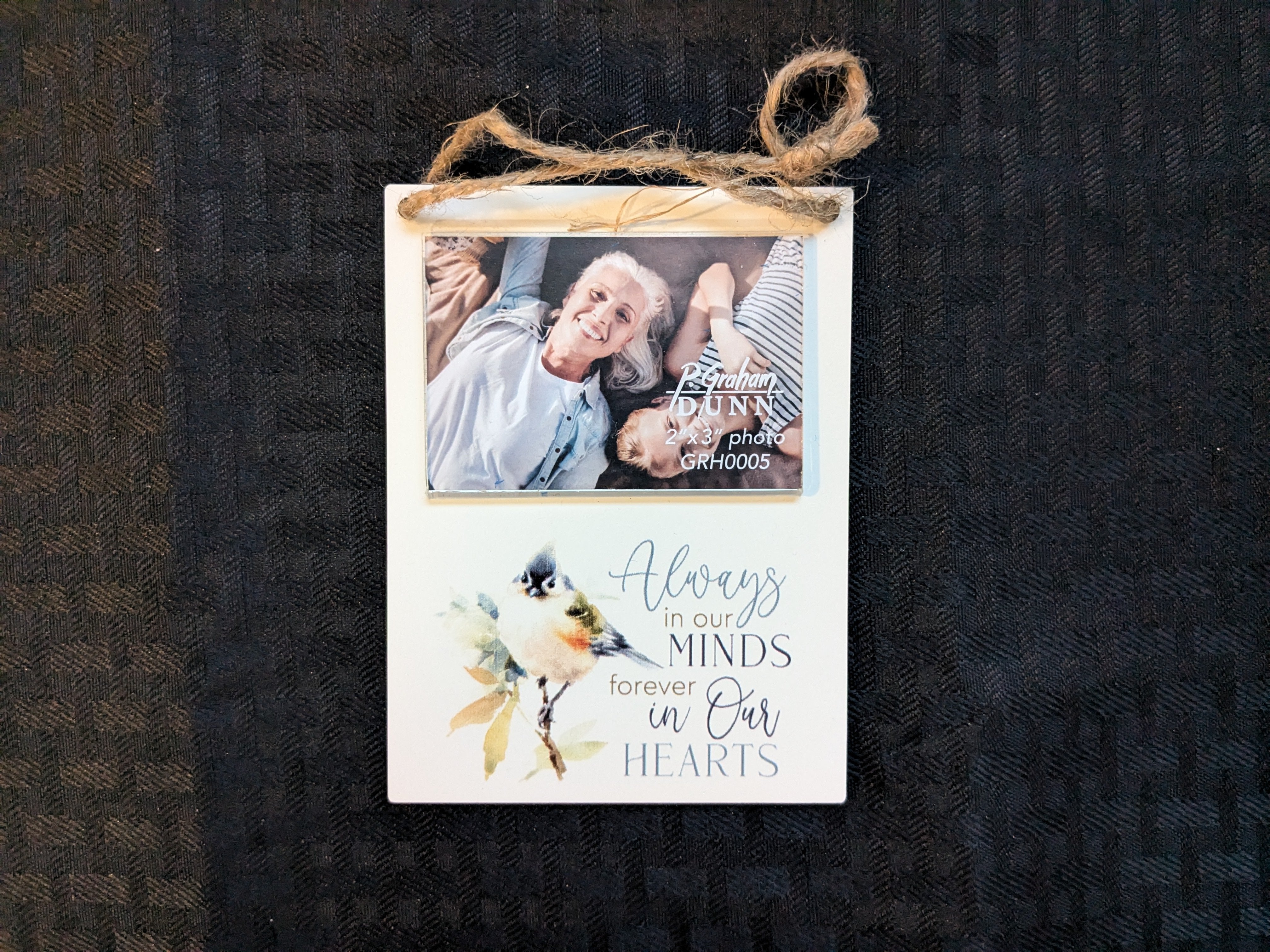 Beautiful photo frame block featuring the phrase 'Always in our minds, always in our hearts.' Perfect for memorial decor, remembrance gifts, and heartfelt tributes. Ideal for honoring loved ones and displaying cherished memories.