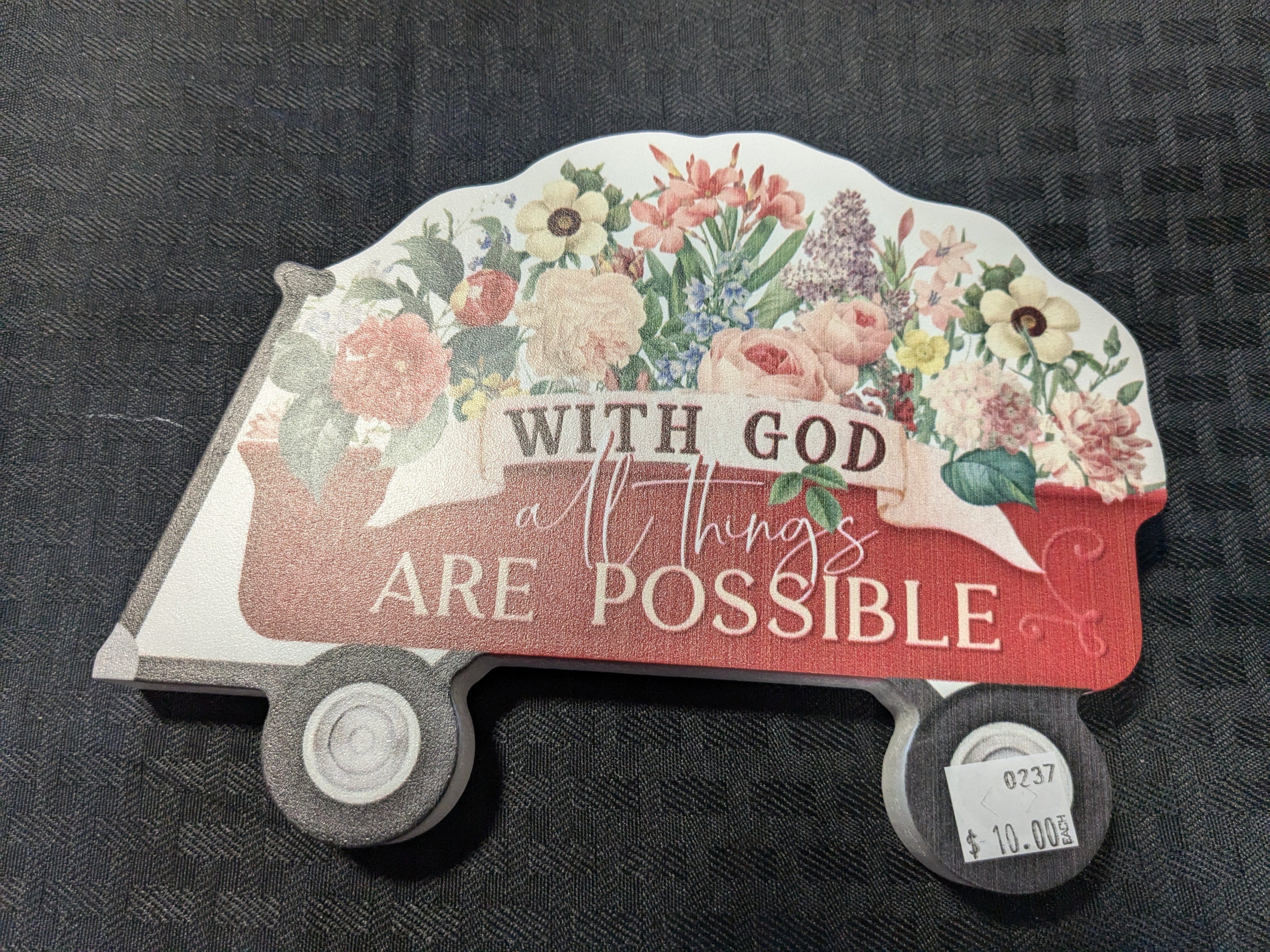 With God All Things Are Possible' wagon shape decor block – a beautifully crafted wooden block featuring an inspirational message in a charming wagon shape. Perfect for adding a meaningful touch to your home decor or as a thoughtful gift.